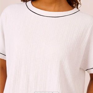 White Ribbed Women's Top with Black Trim Detail